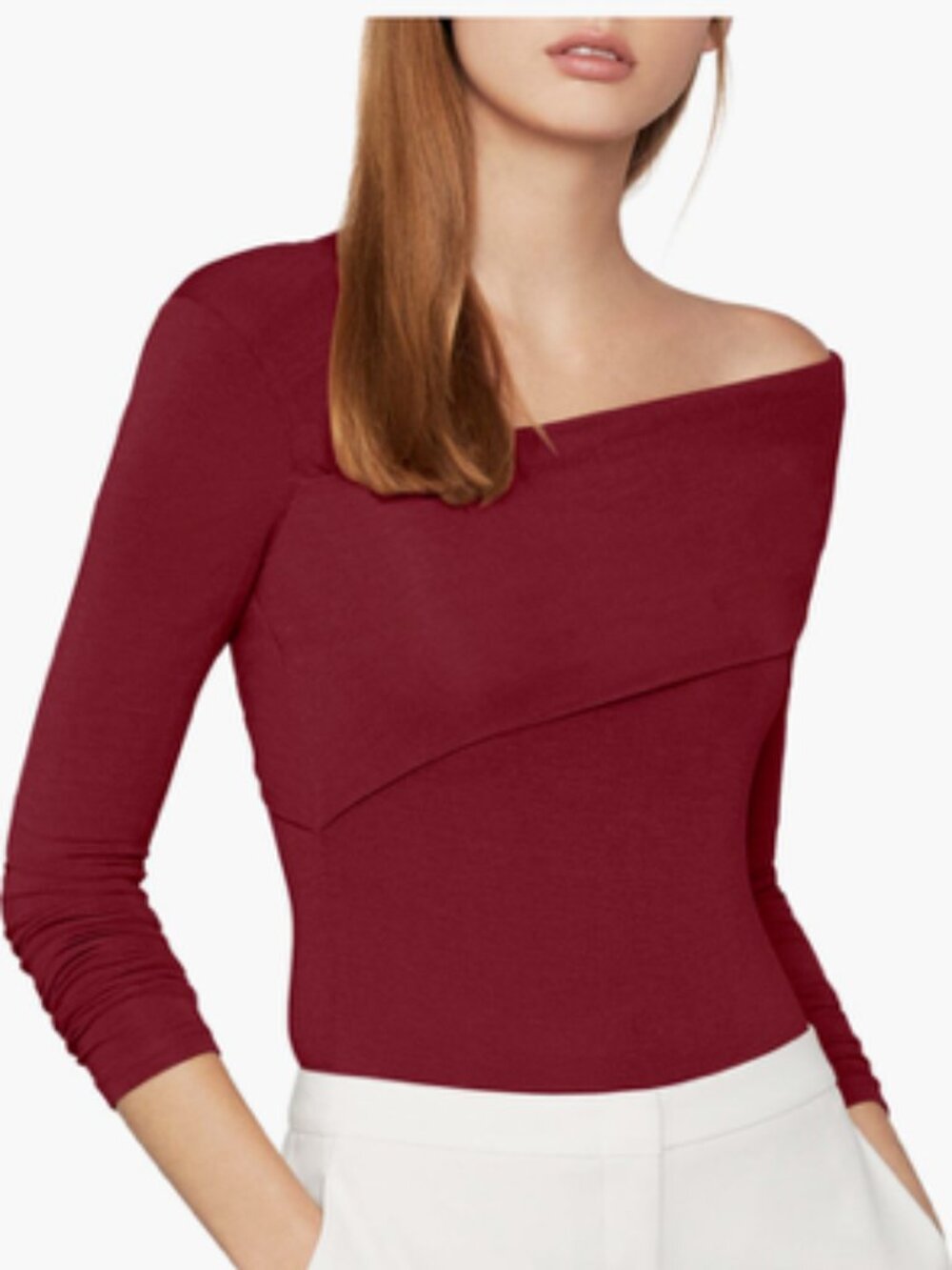 Asymmetric burgundy long-sleeve top.